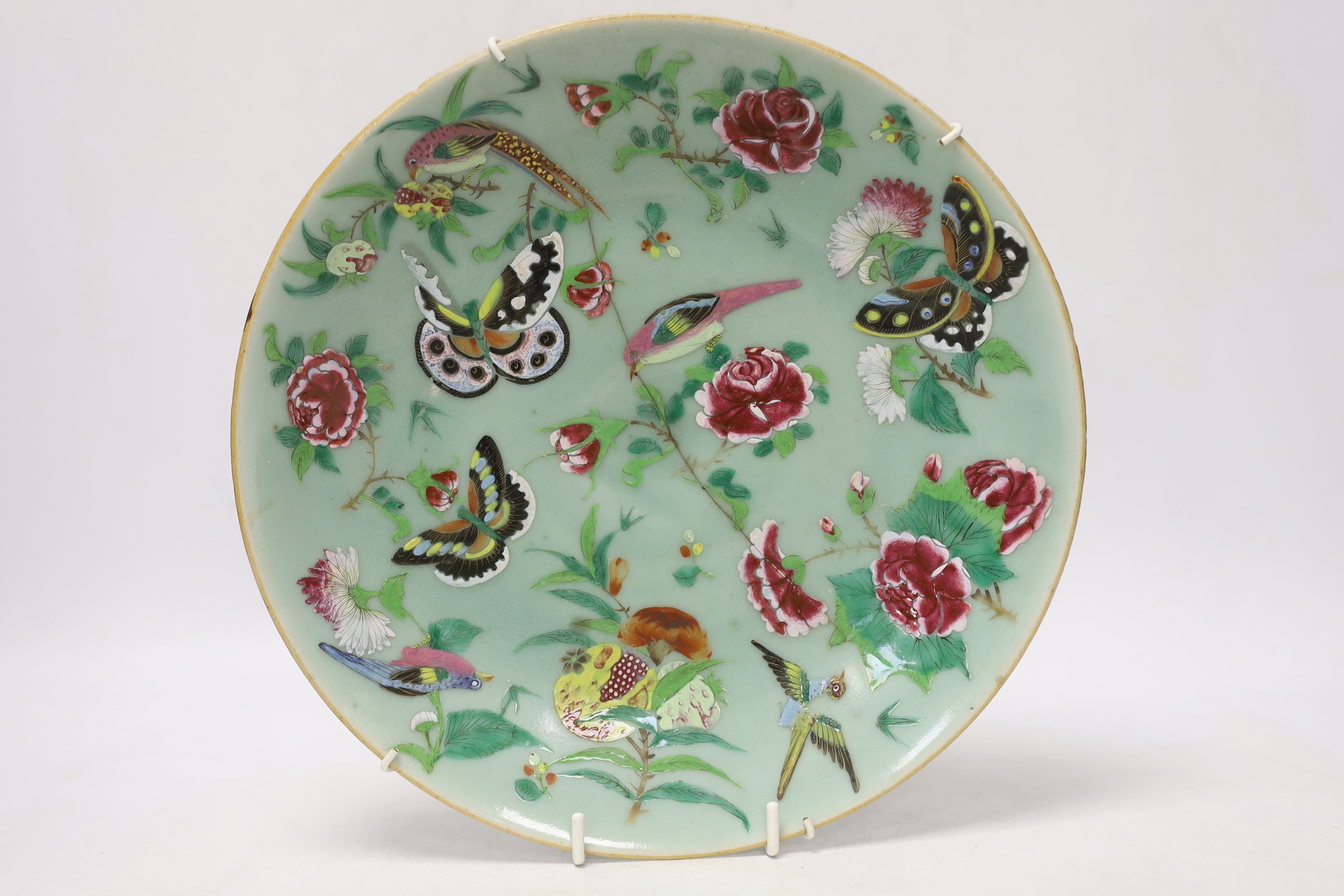 Eight 19th century Chinese celadon glazed famille rose dishes, largest 26cm